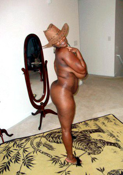 Naked ebony mom posing in front of..