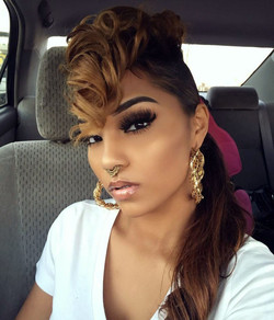 Charming black babe with gorgeous makeup